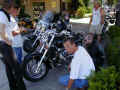 Checkin out Christian's bike.JPG (62990 bytes)